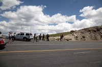 A Park Ranger has to keep people in check.  Approaching these elk too closely is very dangerous.