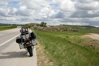 The R1200GSA - clean fresh and fully loaded.  The bike won't ever be this clean again.  I added just under 1 inch to the sidestand to keep the bike from leaning too far on the sidestand.  The Ohlins shocks I installed made the bike sit about 1 inch higher.