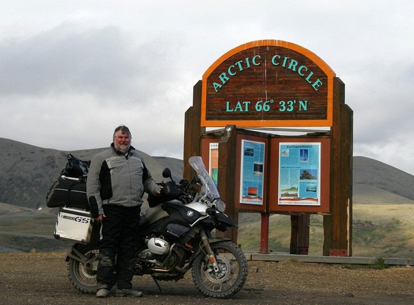 At the Arctic Circle - the wind was at about 30mph, it was about 40 degrees, there wasn't another soul around and the only place I could put the camera was on a table about 30-40 feet away.  The timer was 10 seconds and this was the third take.  I'll bet a video of the process would be priceless.