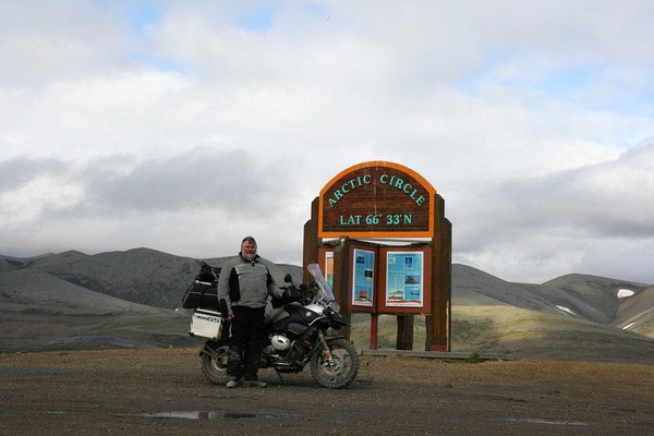 At the Arctic Circle - the wind was at about 30mph, it was about 40 degrees, there wasn't another soul around and the only place I could put the camera was on a table about 30-40 feet away.  The timer was 10 seconds and this was the third take.  I'll bet a video of the process would be priceless.