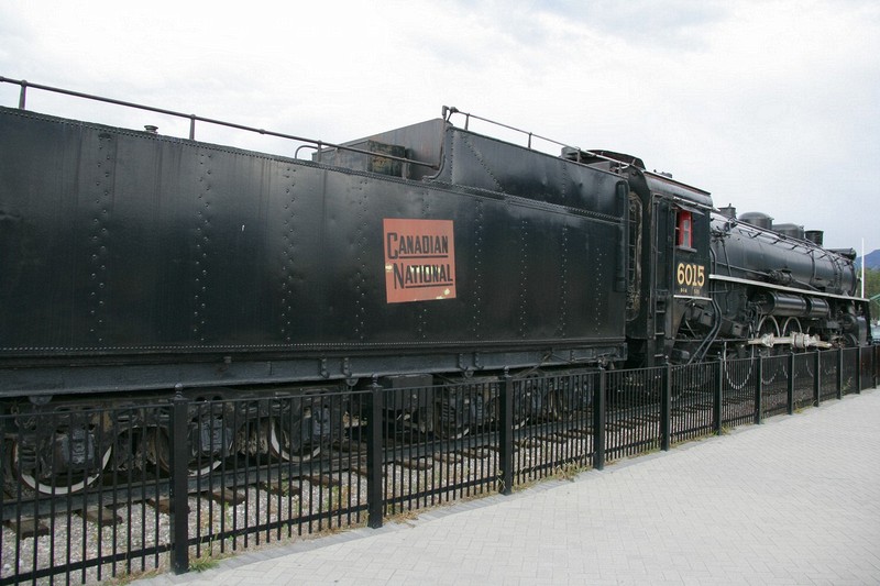 An old steam locomotive on display at the Jasper rail station