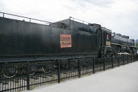 An old steam locomotive on display at the Jasper rail station