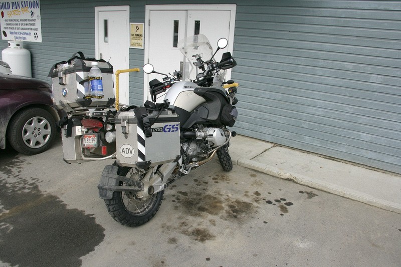 The bike was parked out to the side of the hotel.  I had removed everything but the two Touratech crash bar bags when I parked it for the night.  There wasn't much of anything in the bags, just some camp food, wipes, toilet paper and the like.  During the night some indigents ransacked the bags and took all of the food, the insect repellant and the toilet paper, but left everything else strewn over the parking lot.