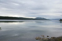 This is al lake along the Klondike Highway.  The clouds are growing and rain is threatening, but I should drive out of it just before Dawson