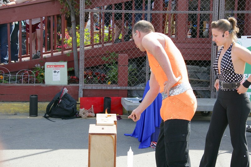 Her 'volunteer' assistant (clearly a plant) sets fire to the board