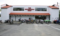 We finally got the bike over to the dealer and unloaded it.
